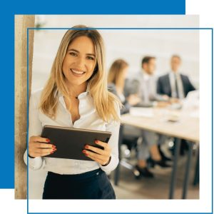 Woman holding an iPad in conference room