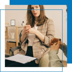 Woman with a sheet of paper in discussion